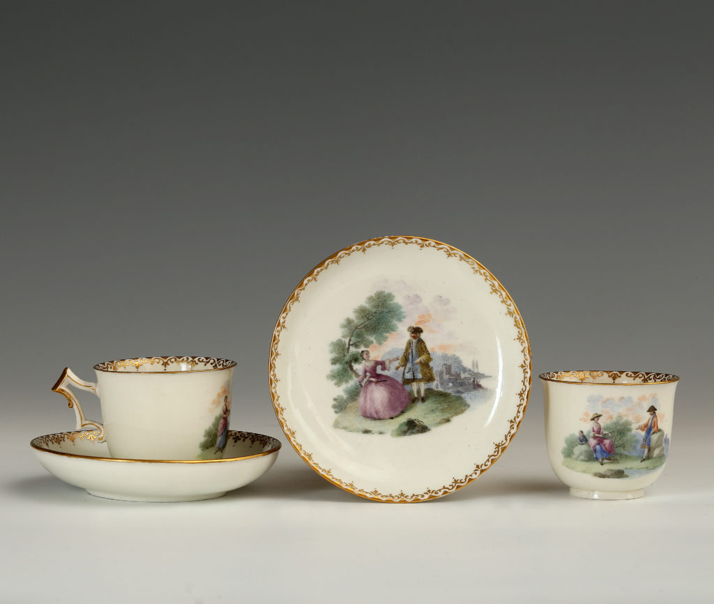 PAIR OF CAPODIMONTE CUPS AND SAUCERS