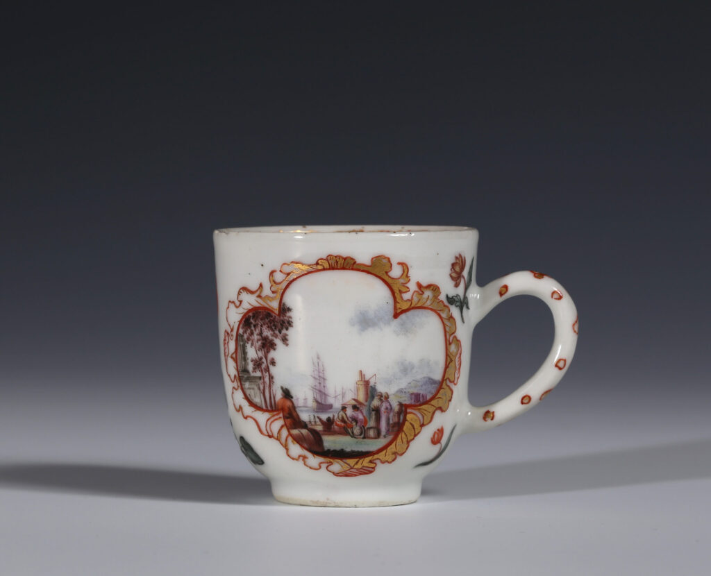 A CHINESE CUP DECORATED IN HOLLAND