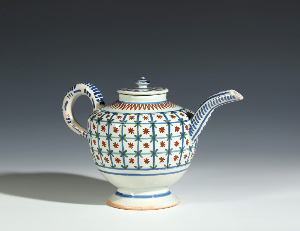 AN ENGLISH DELFT CHEQUERED TEAPOT