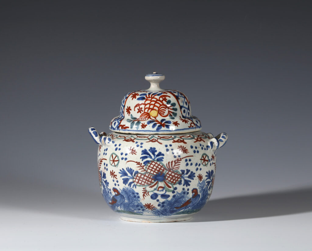A DELFT TWO-HANDLED COVERED JAR