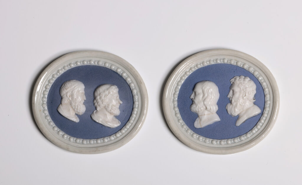A PAIR OF PORCELAIN BLUE-GROUND OVAL DOUBLE PORTRAIT MEDALLIONS