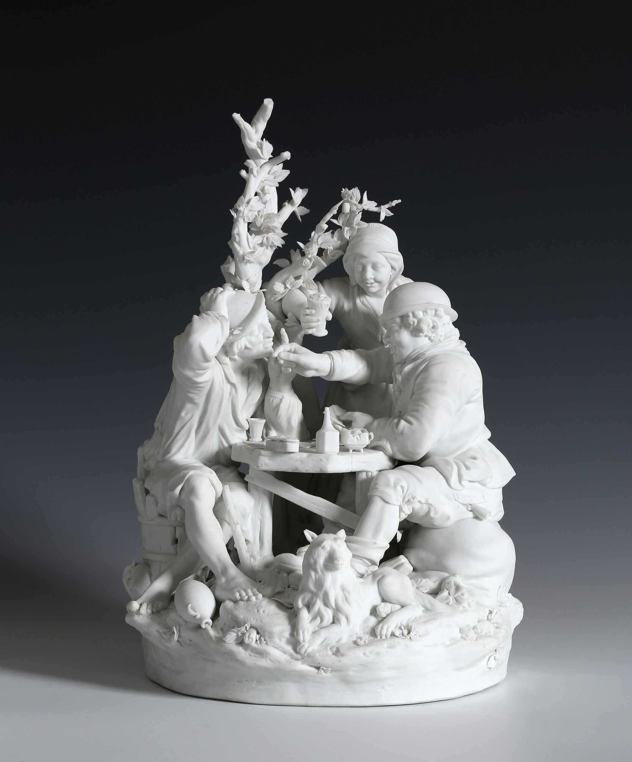 A BISCUIT PORCELAIN GROUP OF CARD PLAYERS  OUD-LOOSDRECHT