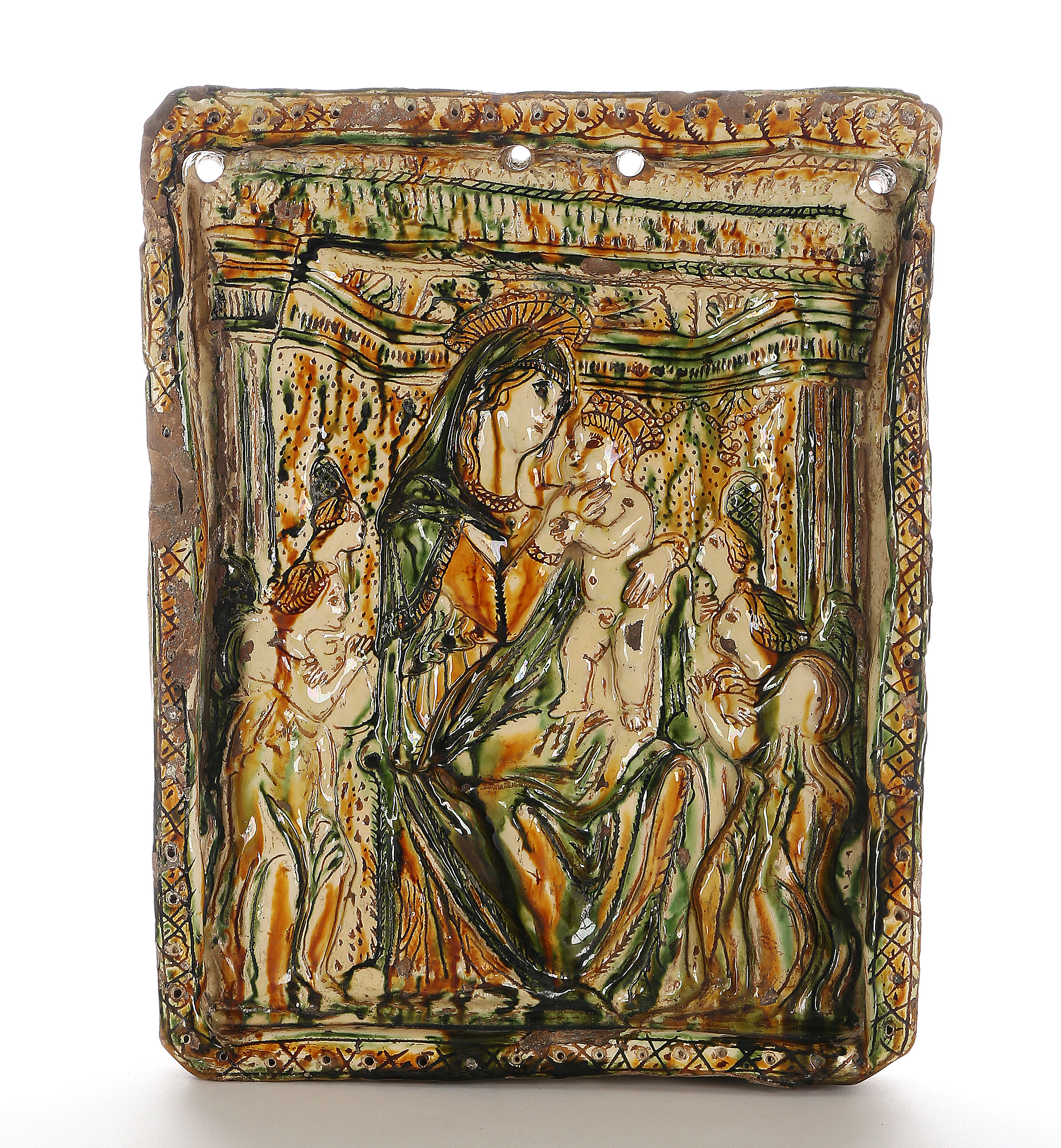 AN INCISED SLIPWARE PLAQUE OF THE MADONNA AND CHILD