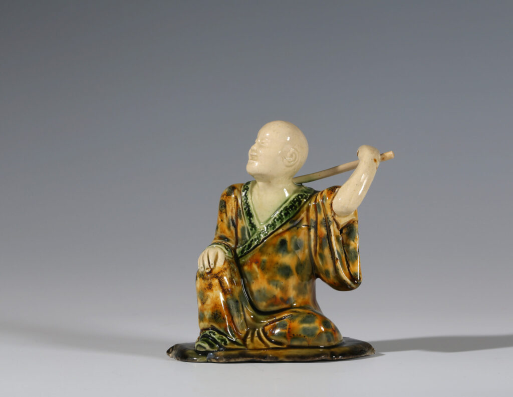 A STAFFORDSHIRE LEAD GLAZED FIGURE OF A LOHAN OF WHIELDON TYPE