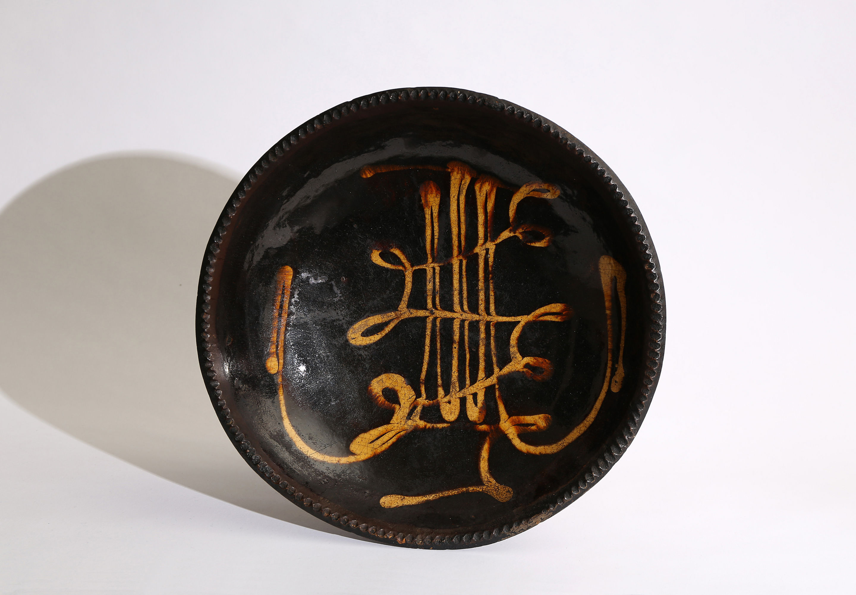 A Shropshire Slip-Trailed Pottery Shallow Bowl