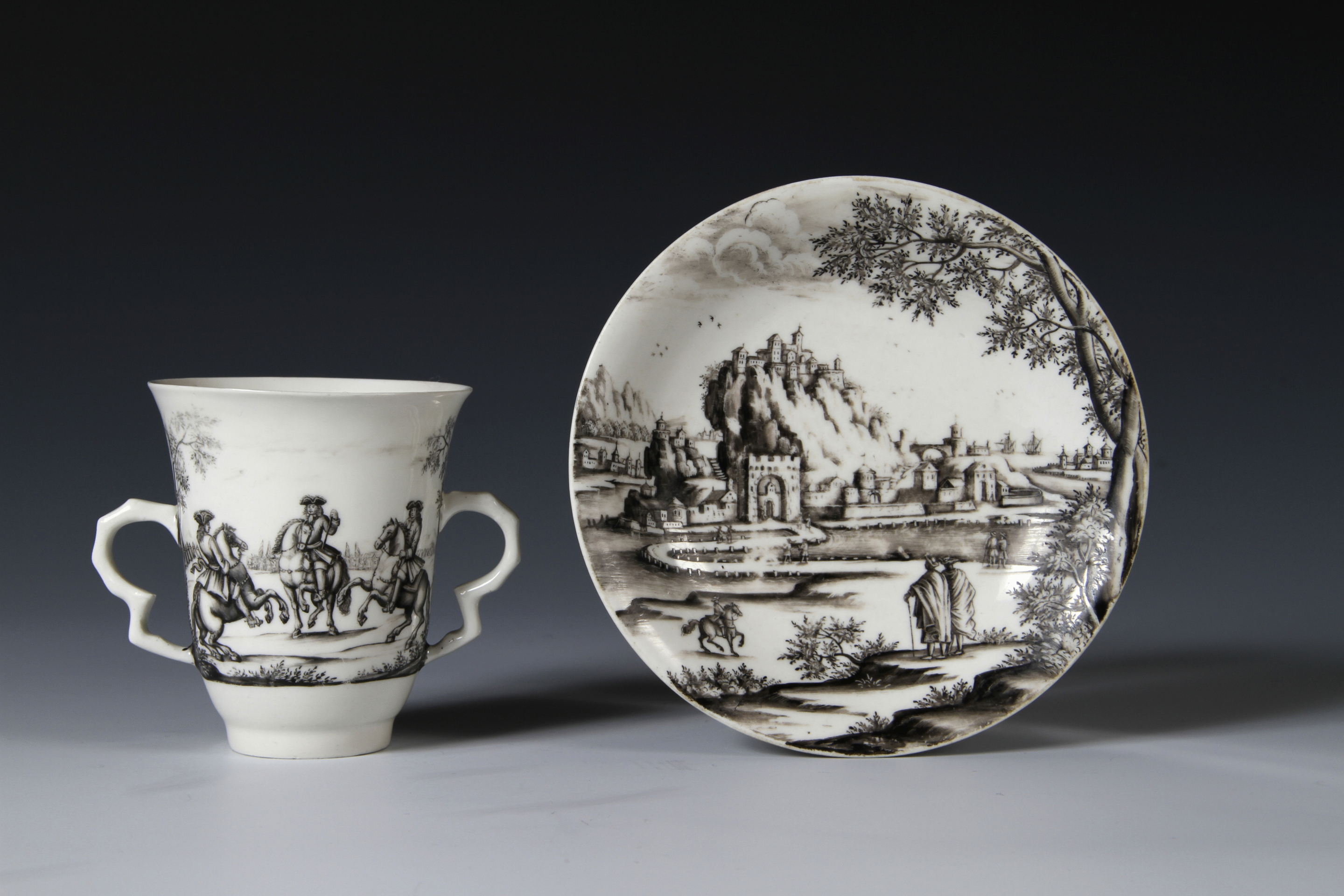 A Meissen Böttger porcelain two-handled beaker and saucer painted by Ignaz Preissler
