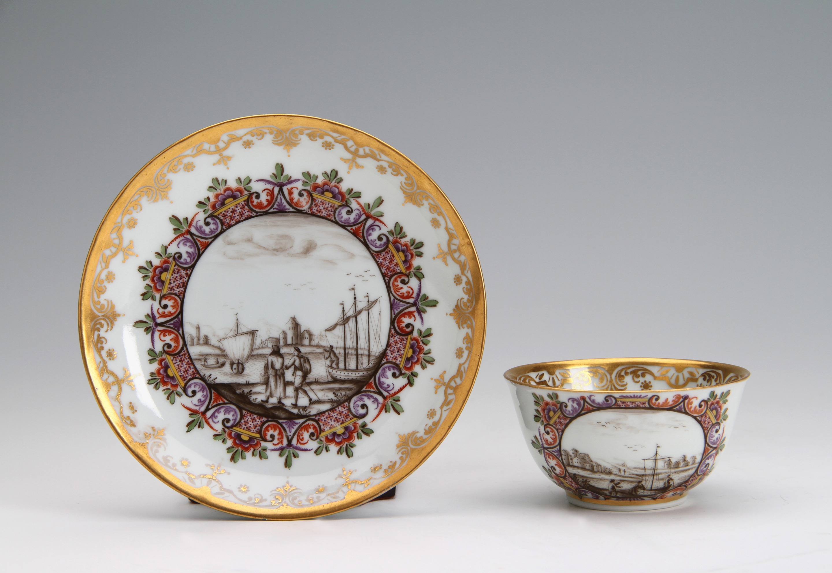 A Chinese porcelain teabowl and saucer decorated in the workshop of Johann Friedrich Metzsch