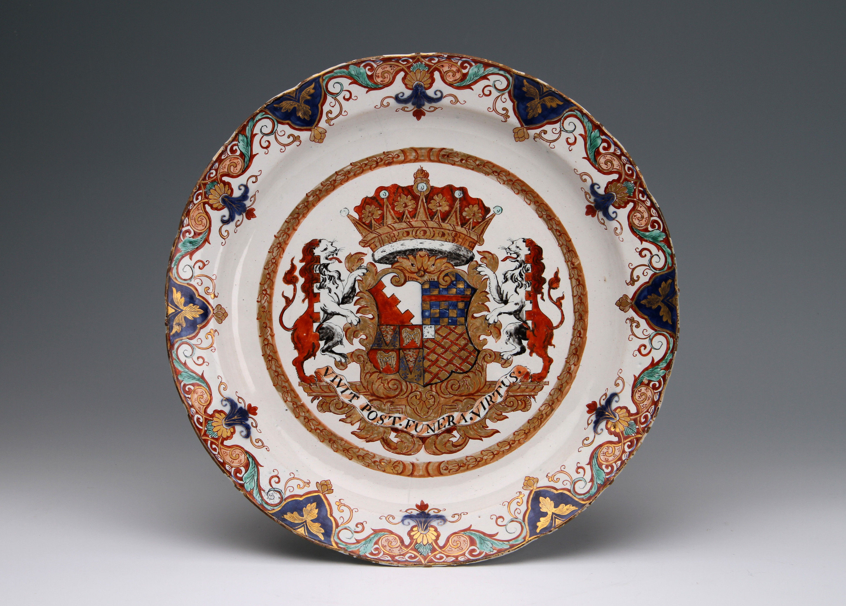 A Dutch Delft delft-doré dish painted with the arms of Boyle