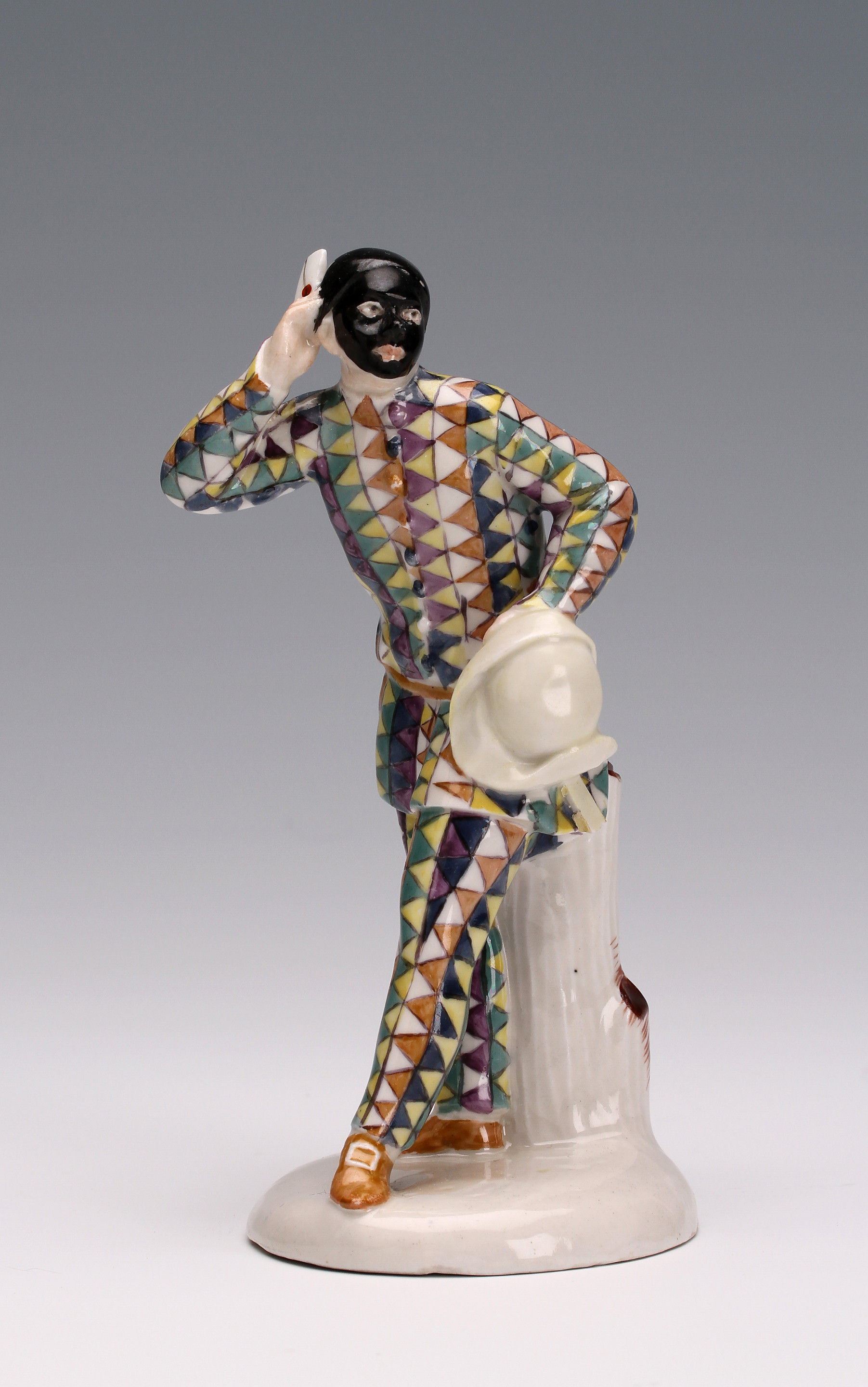 A Closter Veilsdorf figure of Harlequin modelled by Wenzel Neu