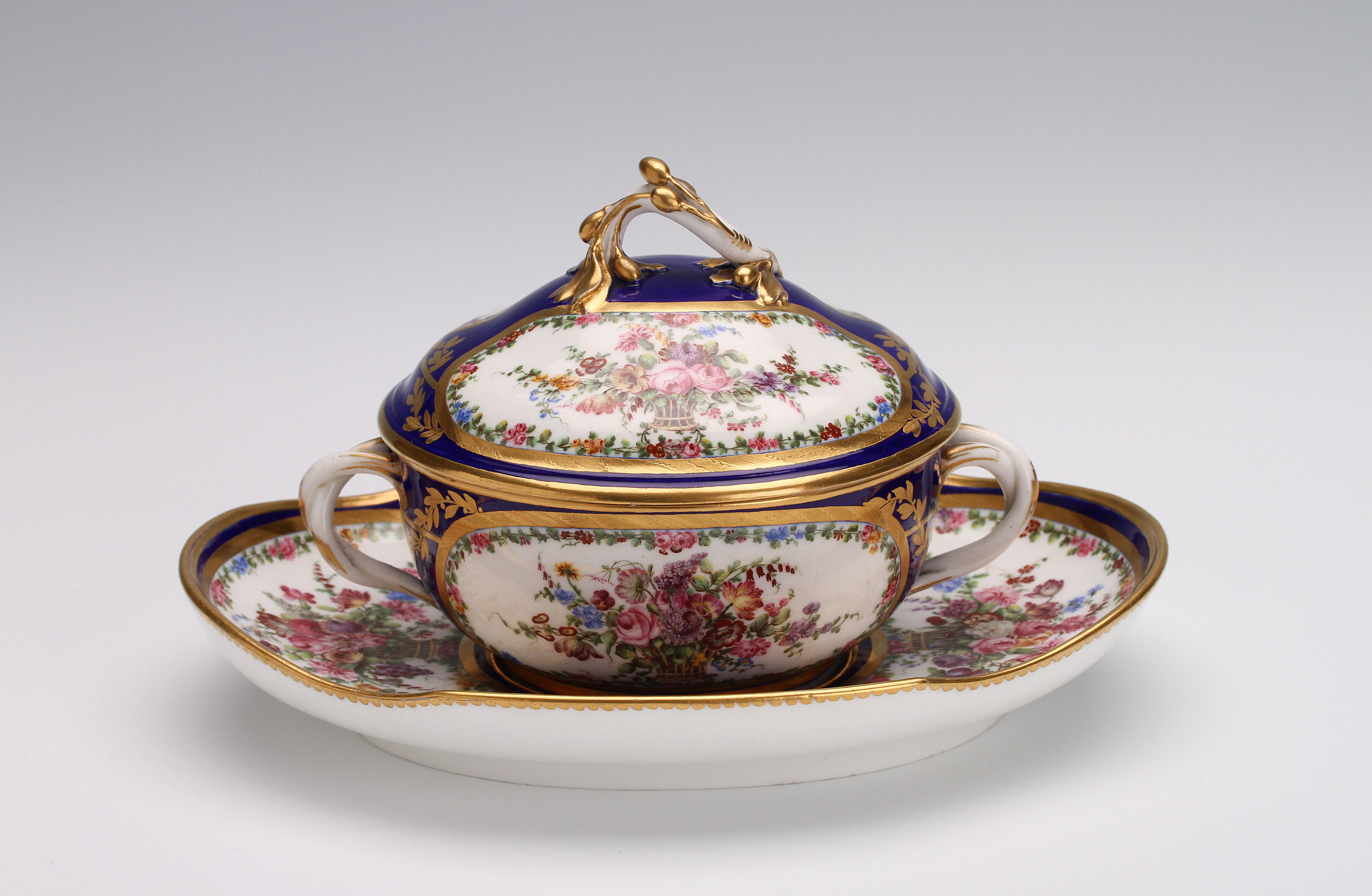 A Sèvres covered bowl and stand, écuelle ‘ronde tournée’ and a plateau ‘ovale’ of the fourth size