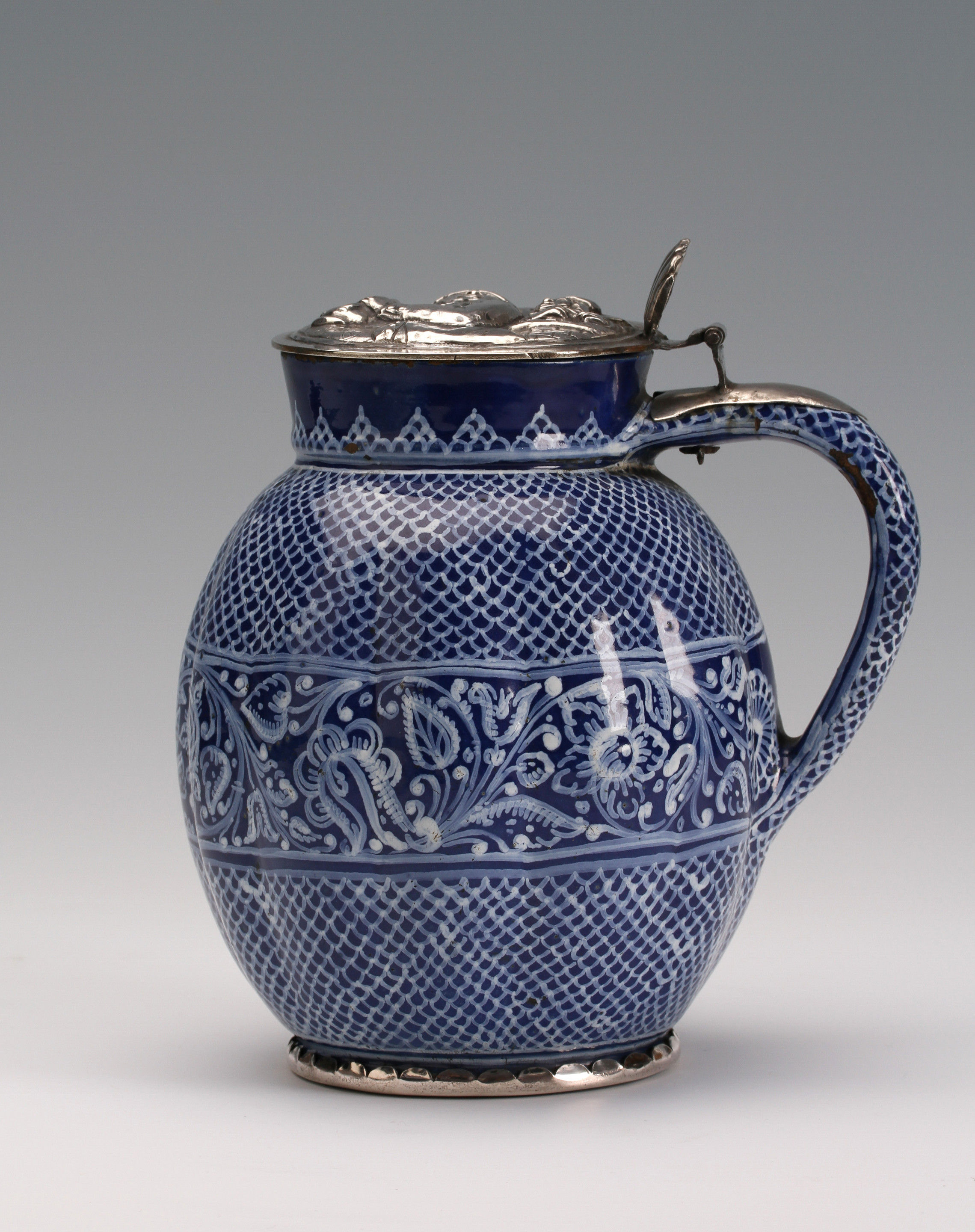 A silver-mounted Anabaptist or Hutterite faience jug