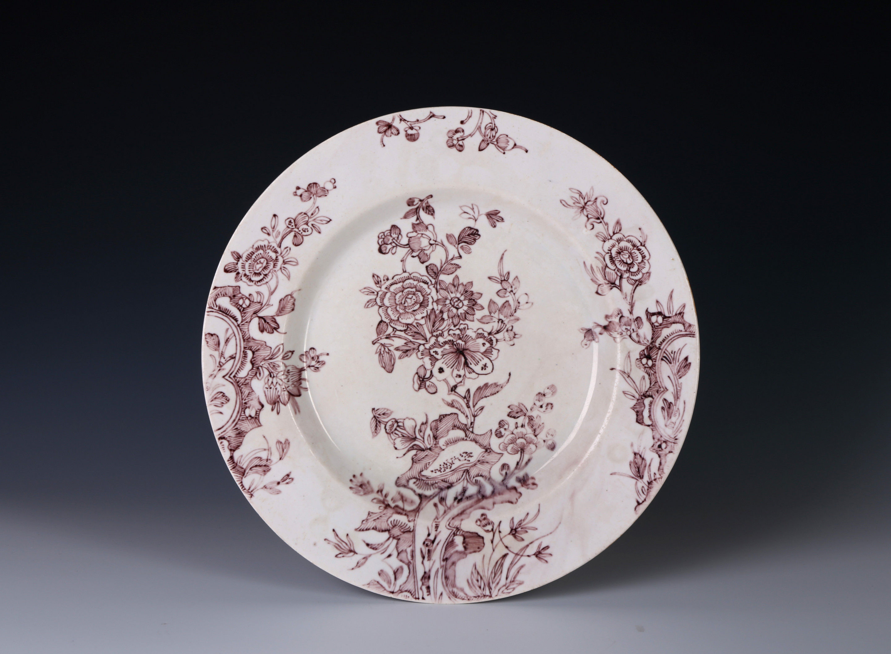 An Experimental English Porcelain dish decorated in Manganese